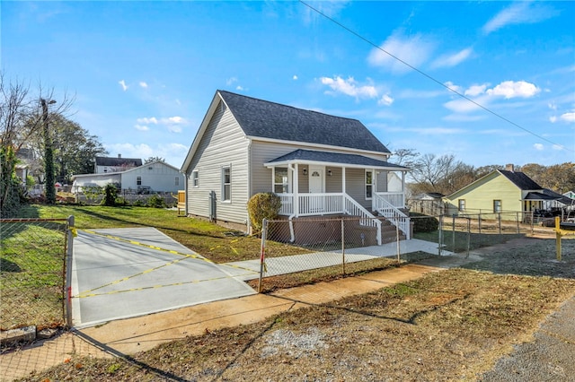 bungalow-style house with a front yard and a porch