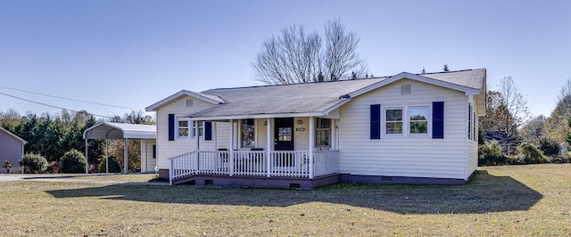 view of front of house featuring a carport, a porch, and a front yard