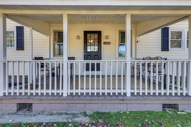 entrance to property with a porch