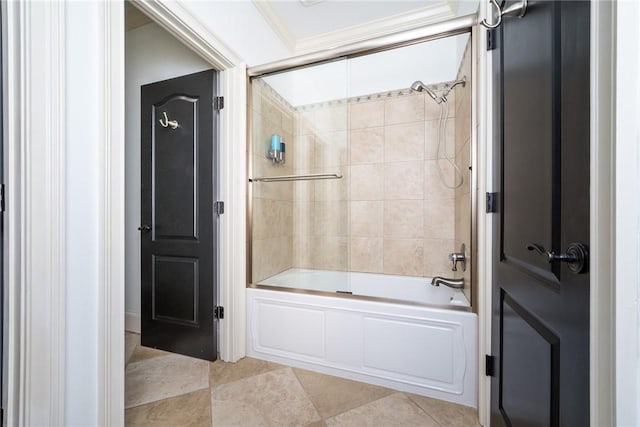 bathroom featuring shower / bath combination with glass door and crown molding