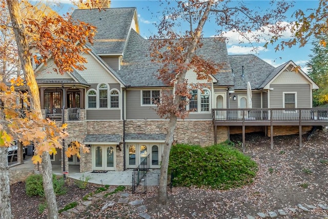 back of property featuring a patio