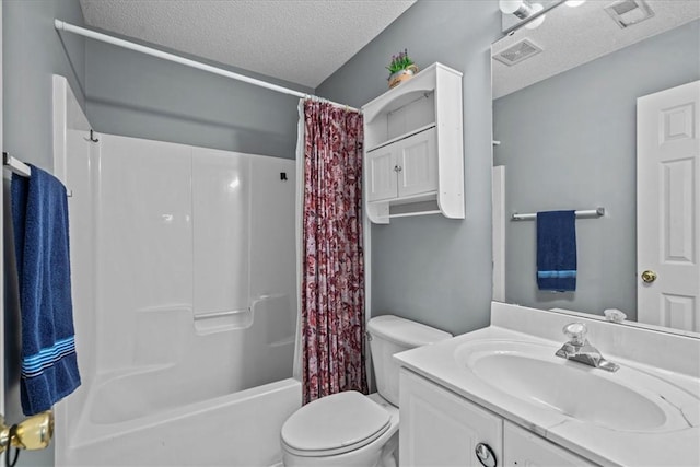 full bathroom featuring shower / tub combo, vanity, a textured ceiling, and toilet