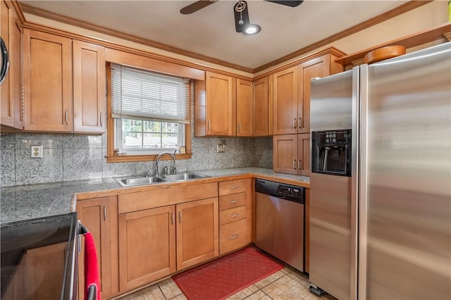 kitchen with backsplash, ceiling fan, sink, and appliances with stainless steel finishes