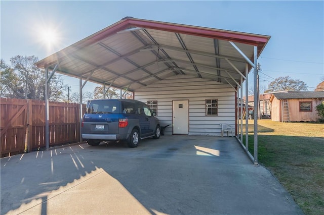 view of vehicle parking with a lawn and a carport