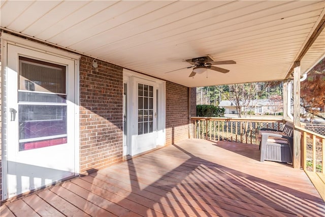 wooden deck with ceiling fan