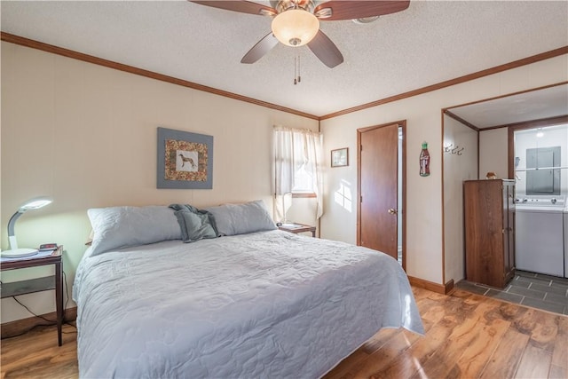 bedroom with a textured ceiling, ceiling fan, ornamental molding, and dark wood-type flooring