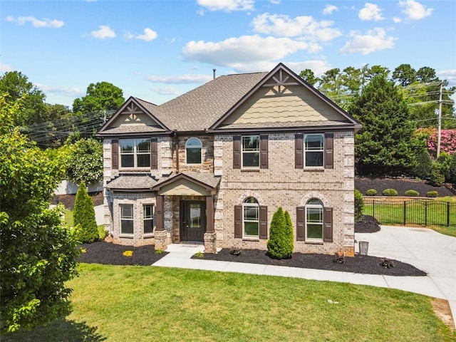 view of front of property with a front lawn