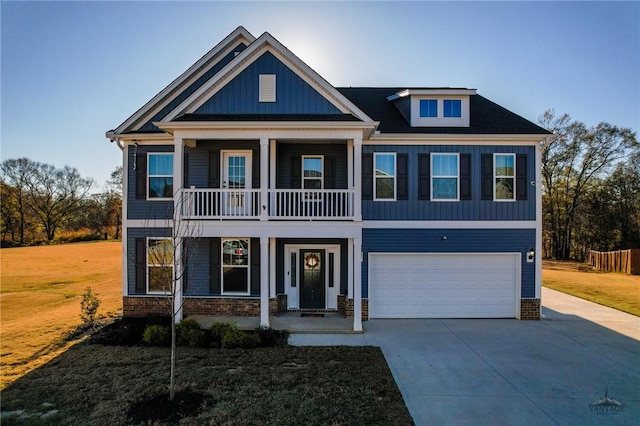 view of front of house with a garage and a front yard