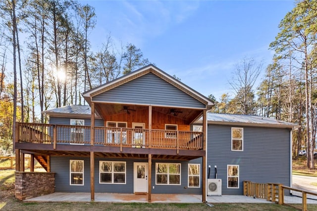 back of property featuring ac unit, ceiling fan, a patio, and a wooden deck