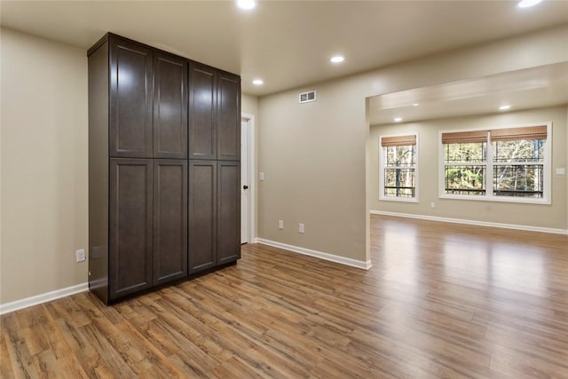 unfurnished room featuring light wood-type flooring