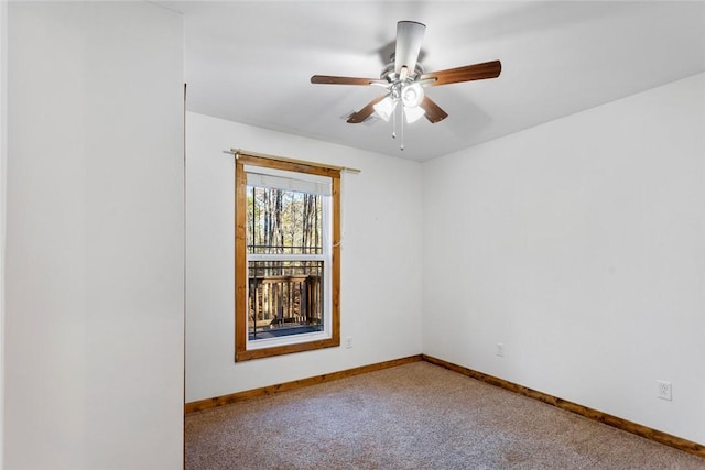 unfurnished room with carpet flooring and ceiling fan