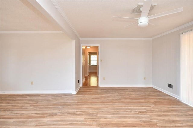 unfurnished room featuring ceiling fan, light hardwood / wood-style flooring, crown molding, and a textured ceiling