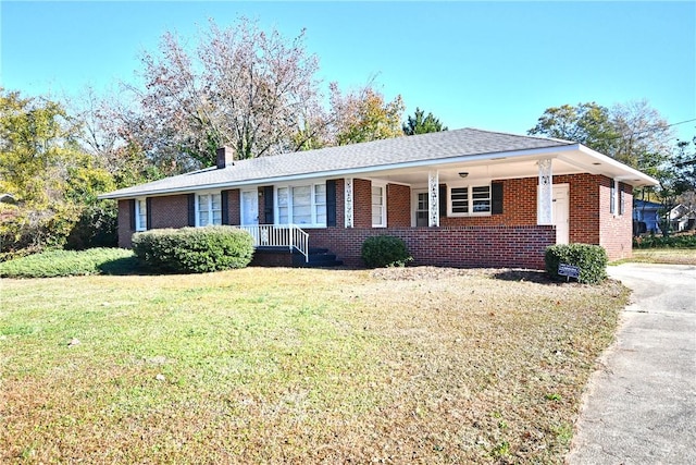 ranch-style house with a front lawn