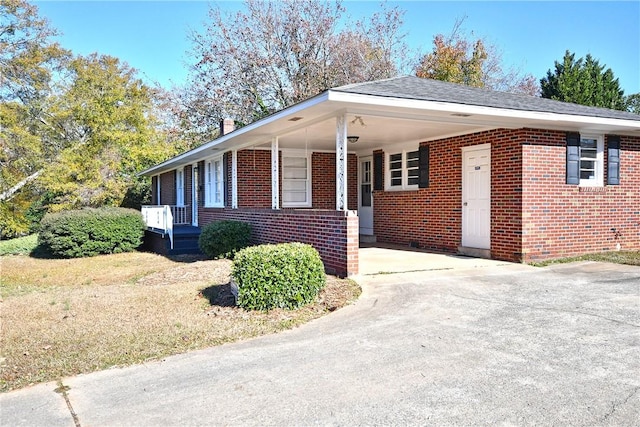 view of front of house featuring a carport