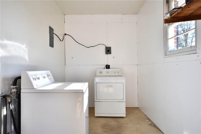 washroom with independent washer and dryer