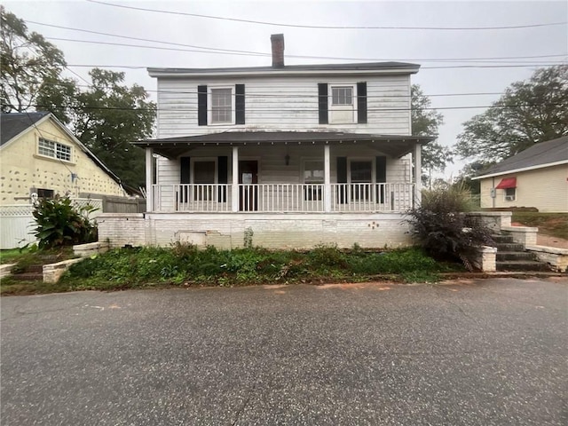 view of front of house with covered porch