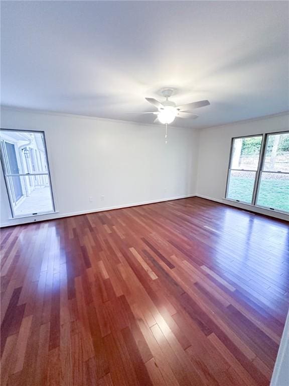 unfurnished room featuring ceiling fan and wood-type flooring