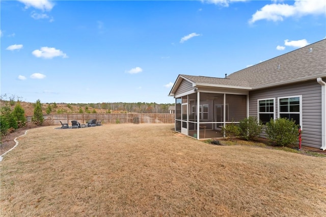 view of yard with a sunroom