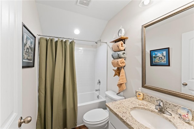 full bathroom featuring toilet, shower / bath combination with curtain, vanity, and vaulted ceiling