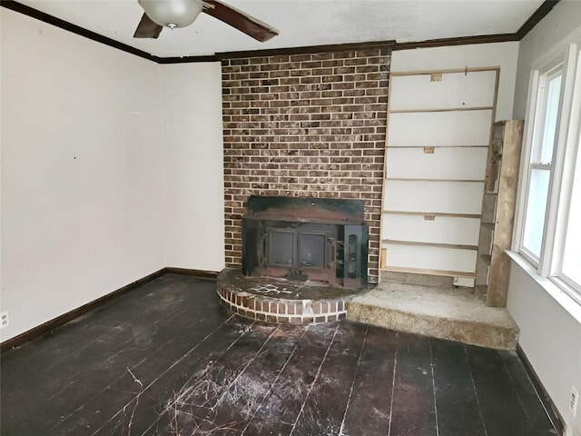 unfurnished living room featuring hardwood / wood-style floors, ceiling fan, a healthy amount of sunlight, and a wood stove