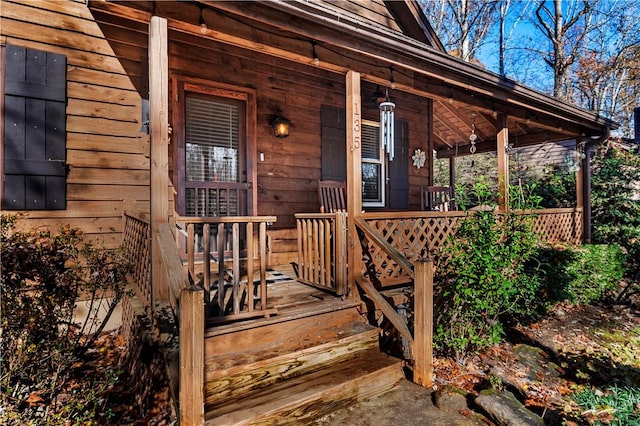 doorway to property with a porch