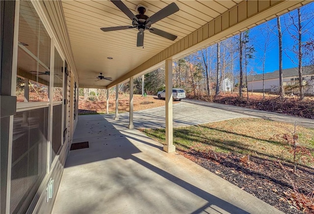 view of patio featuring ceiling fan