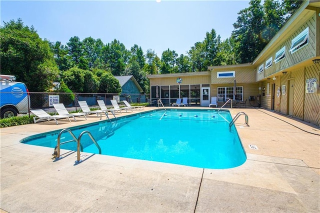 view of pool featuring a patio