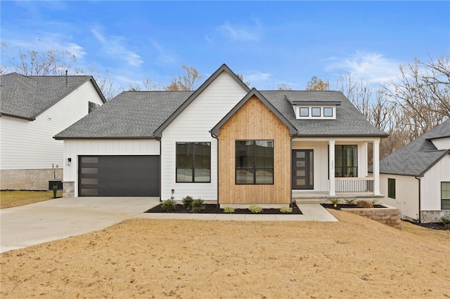 modern farmhouse style home with covered porch and a garage