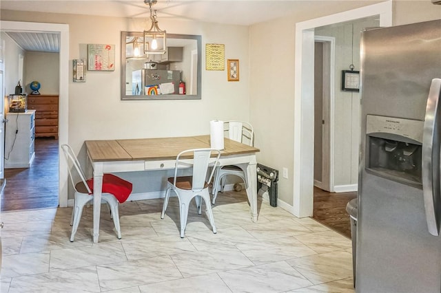 dining room with light wood-type flooring