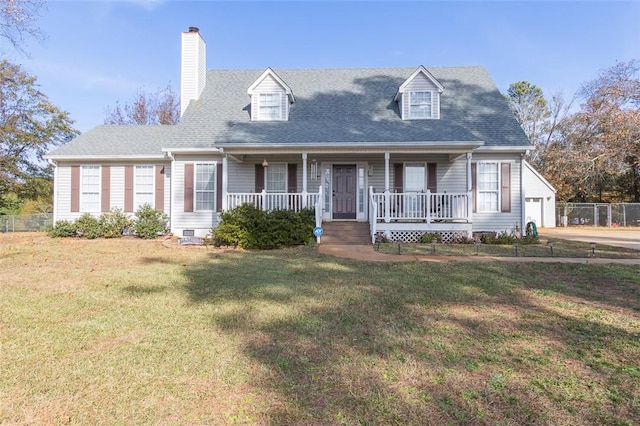 cape cod house with covered porch, a garage, an outdoor structure, and a front lawn