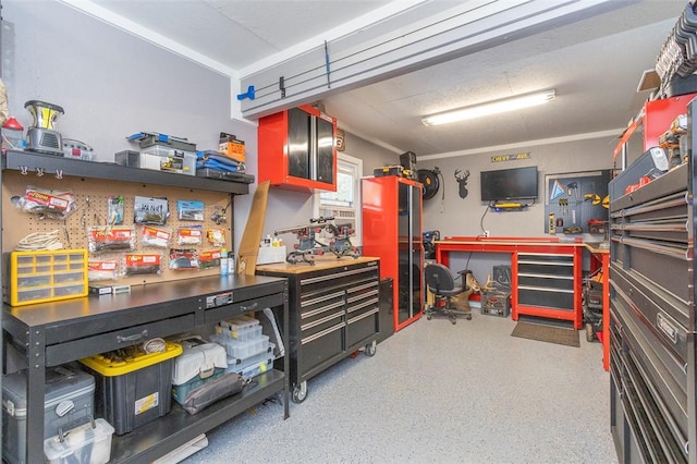 garage featuring a workshop area