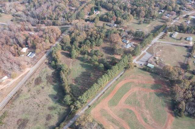 birds eye view of property featuring a rural view