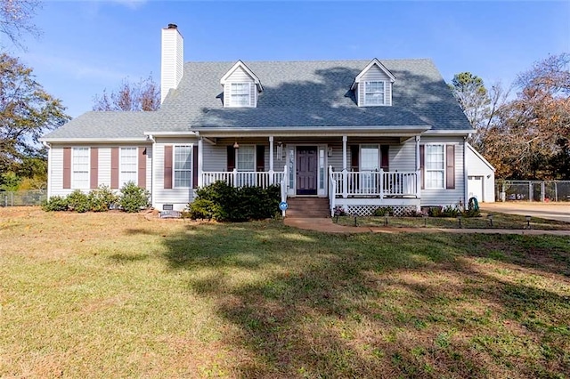 cape cod house featuring covered porch, concrete driveway, a front yard, crawl space, and a chimney