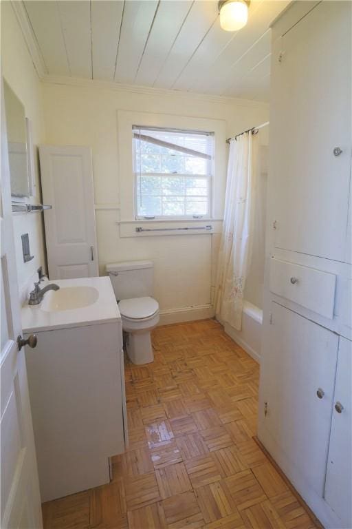 full bath with toilet, shower / bath combination with curtain, and vanity