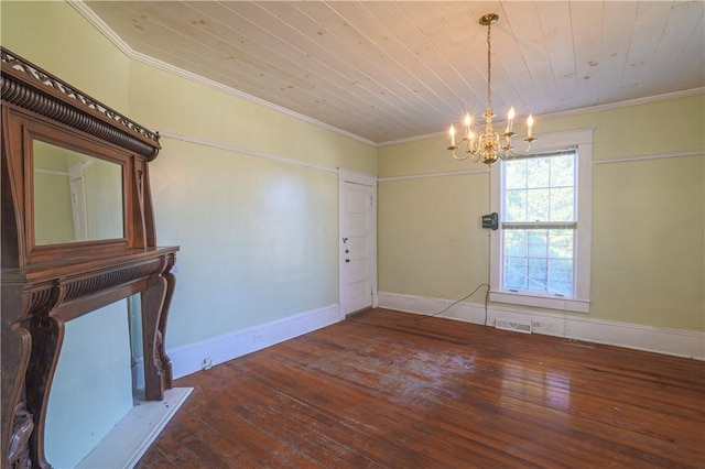 unfurnished room featuring visible vents, wood finished floors, and ornamental molding