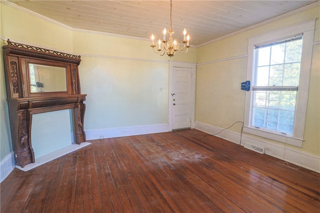 interior space featuring wood finished floors, visible vents, baseboards, an inviting chandelier, and crown molding