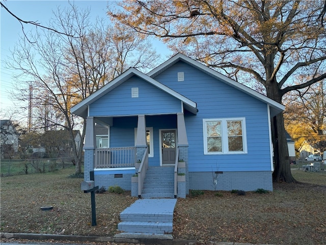 bungalow-style home featuring a porch