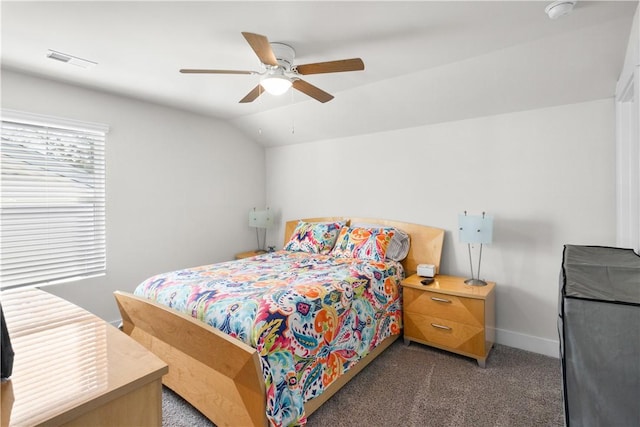 carpeted bedroom featuring ceiling fan and lofted ceiling