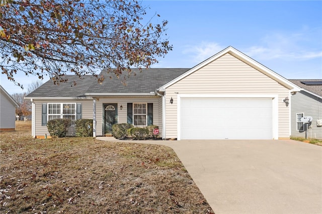 ranch-style home with a garage