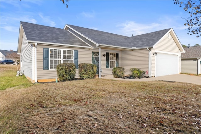 ranch-style home featuring a front lawn and a garage