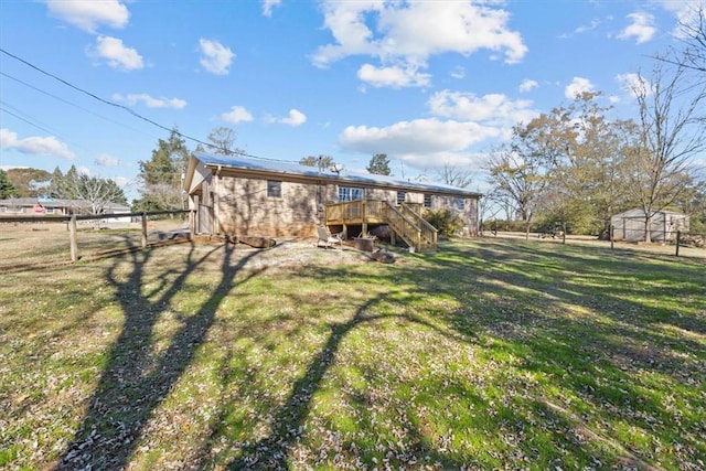 view of yard with a deck