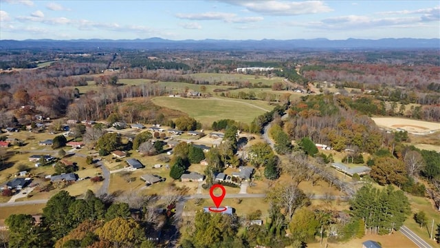 drone / aerial view featuring a mountain view