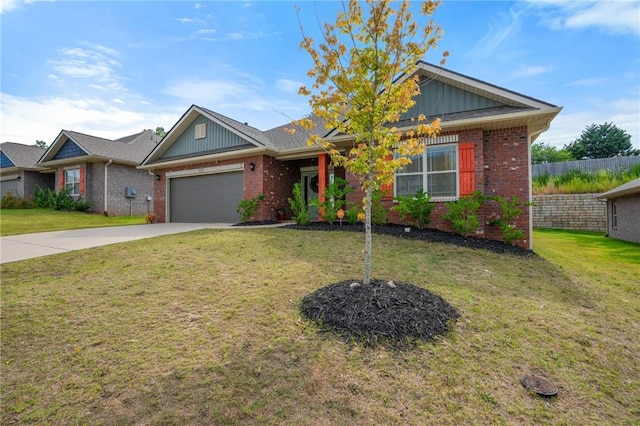 view of front of property with a garage and a front lawn