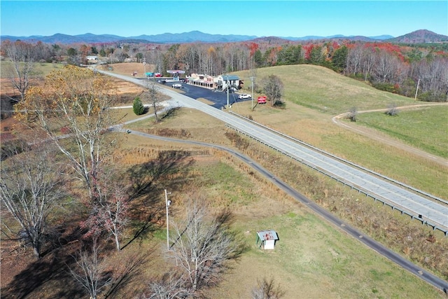 aerial view featuring a mountain view and a rural view