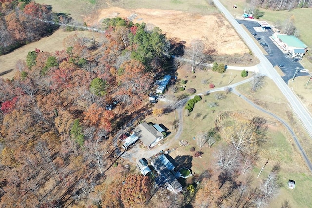 birds eye view of property featuring a rural view