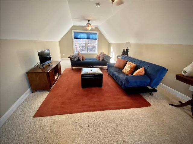 living room featuring carpet flooring, ceiling fan, and vaulted ceiling