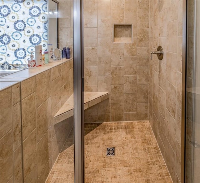 bathroom featuring walk in shower