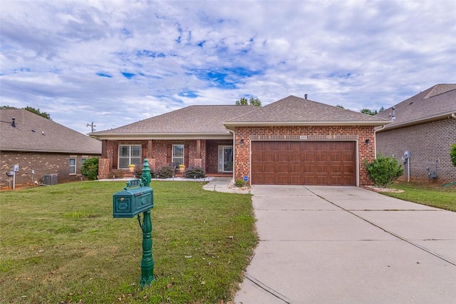 ranch-style house featuring central AC, a front lawn, and a garage