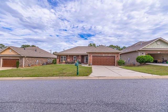 ranch-style home with a front lawn and a garage