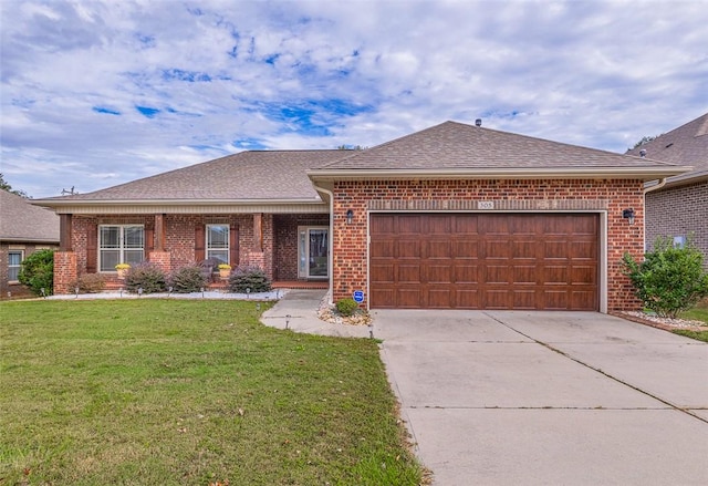 single story home with a front lawn and a garage